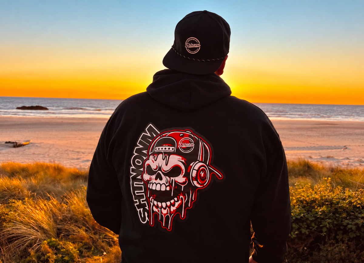 SHTNONM Skull Slapper hoodie at sunset